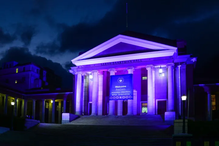 Sarah Baartman Hall lit with purple lights
